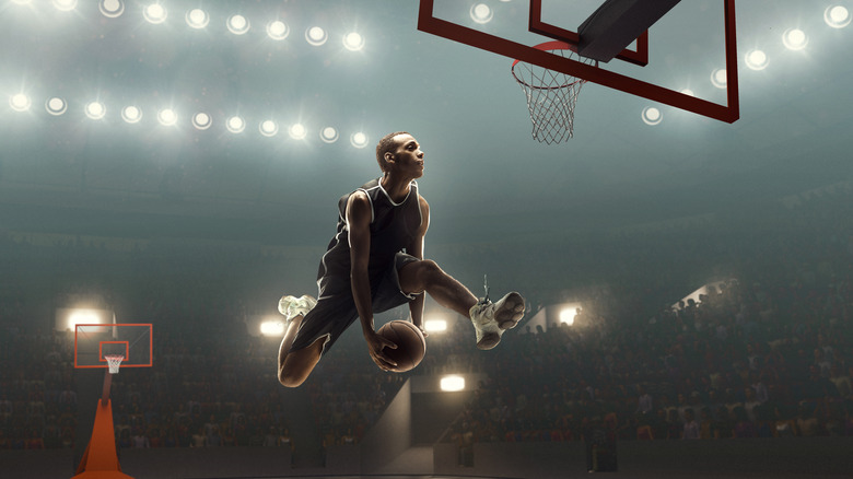 Basketball player dunking