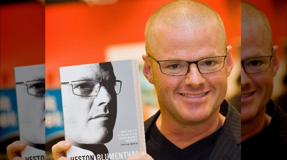 Heston Blumenthal with his book