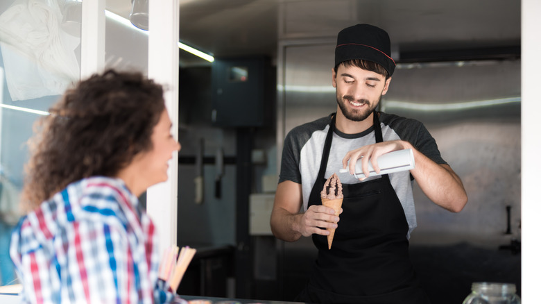 Woman buying ice cream