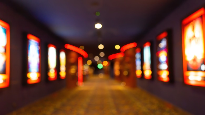 Blurred movies posters inside theater