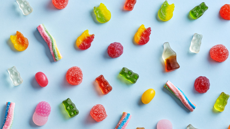 Assortment of candy on a blue background