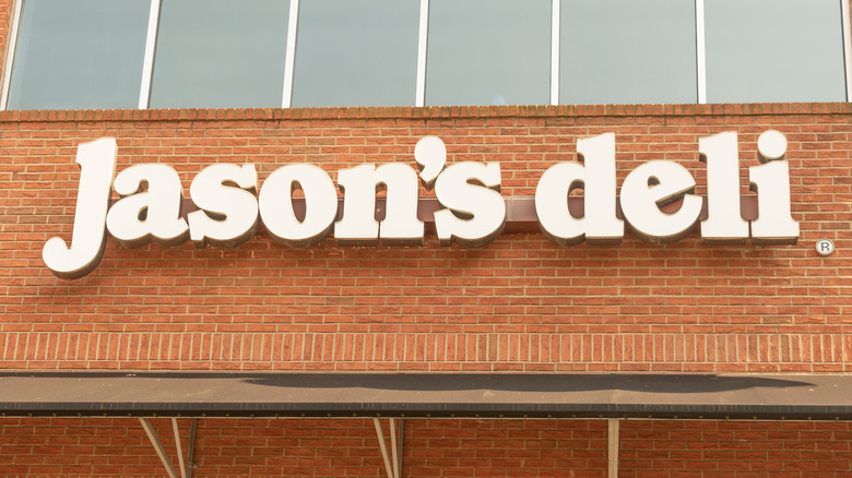 Brown brick Jason's Deli sign