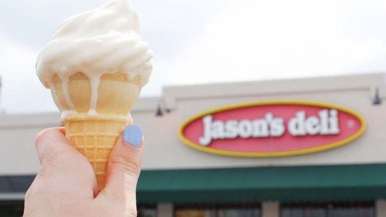 Ice cream cone held aloft outside Jason's Deli