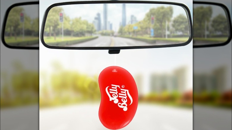 jelly belly air freshner hanging from rear view mirror