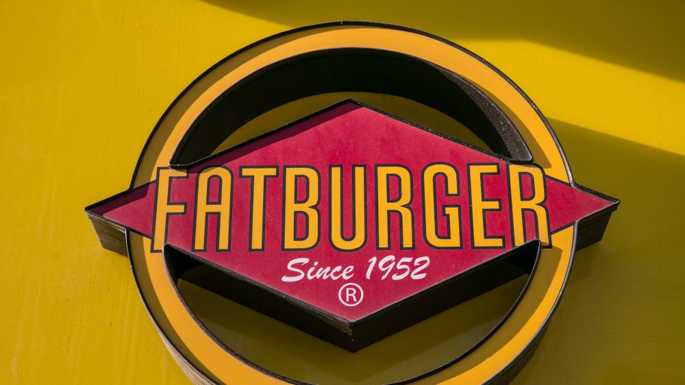 johnny rockets is being bought by fatburger