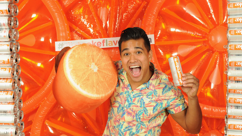 Jordan Andino in coke orange photo booth