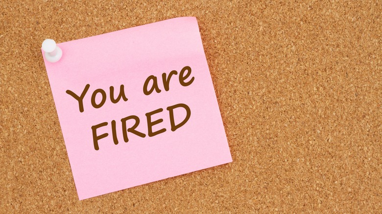 Pink Post-It with "you're fired" message