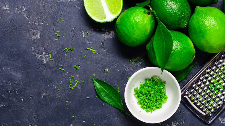 Lime zest, limes, and grater