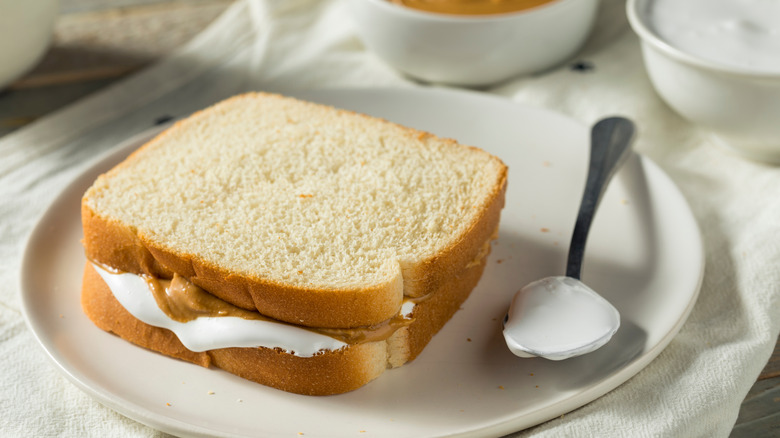 fluffernutter sandwich on white plate 