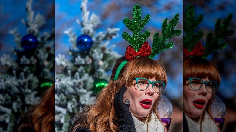 Mary Berg wearing reindeer antlers