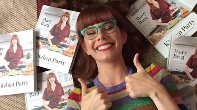 Mary Berg and copies of her book