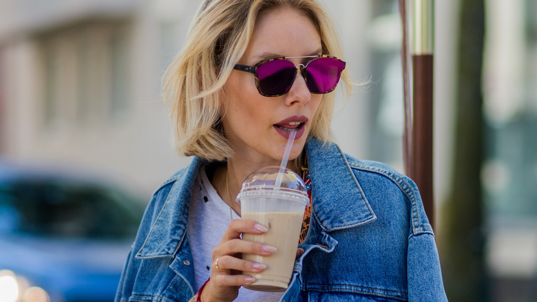 Woman with iced coffee