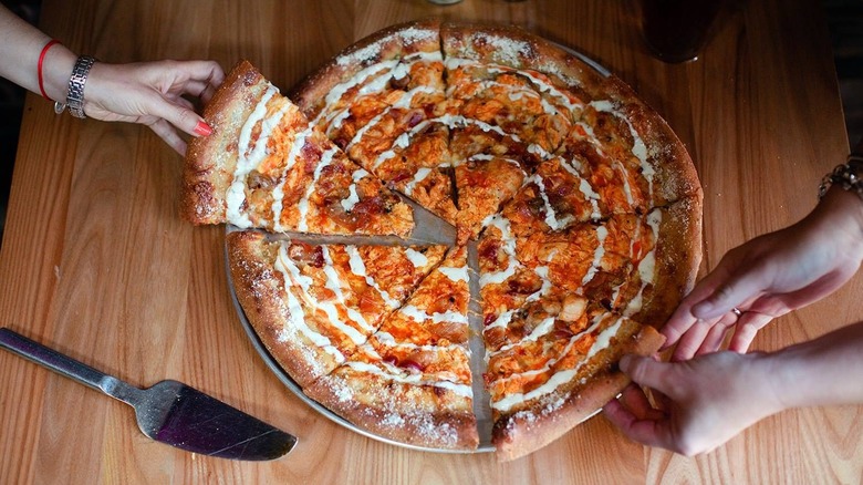 Mellow Mushroom pizza on table 