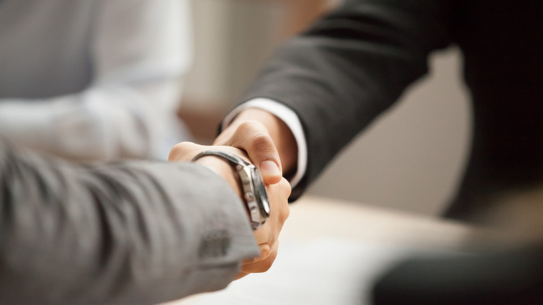 Business people shaking hands