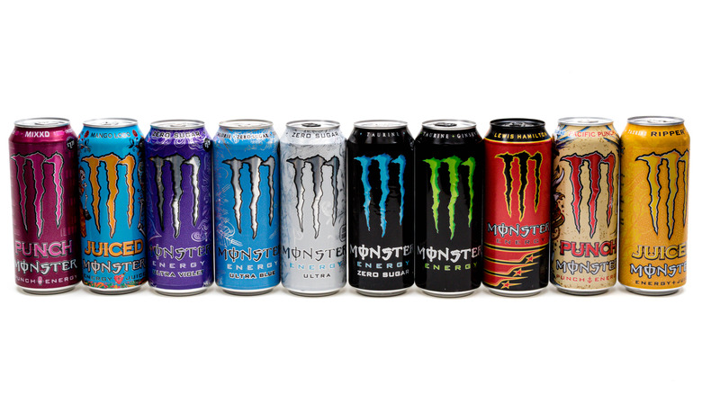 several cans of monster energy drink varieties