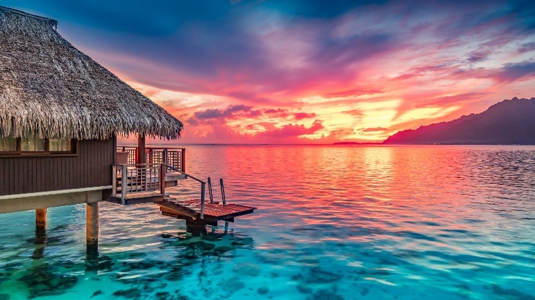 beach bungalow with sunset