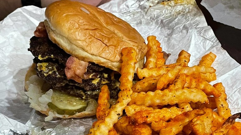 Burger and crinkle cut fries