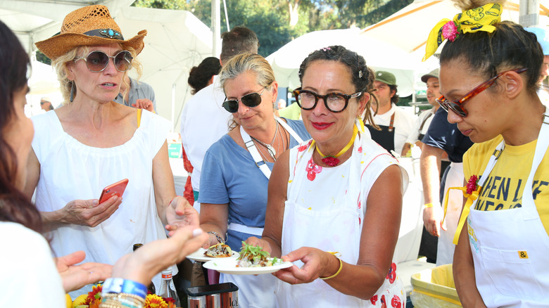 Nancy SIlverton serving food at an event