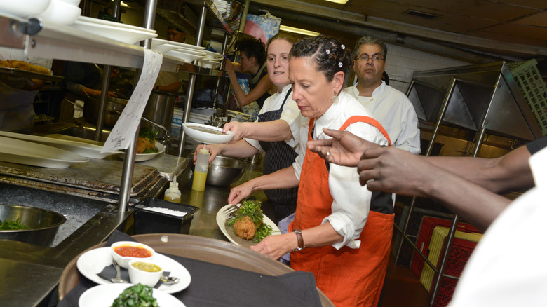 Nancy Silverton cooking with sous chefs