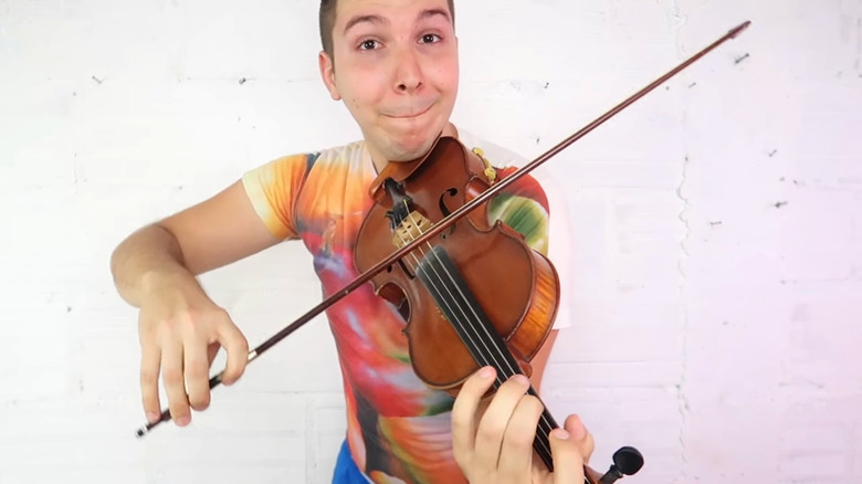 Nikocado Avocado playing the violin