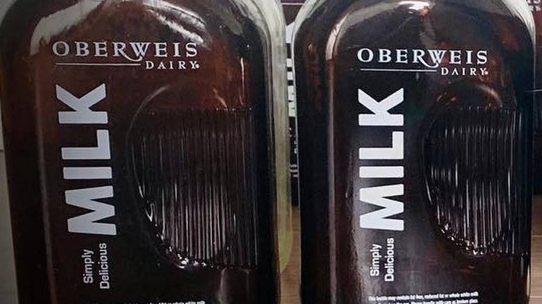 Amber bottles of Oberweis Milk