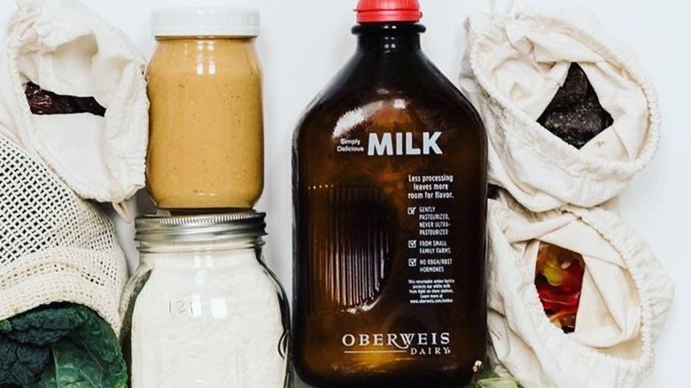 amber Oberweis milk bottle with groceries 