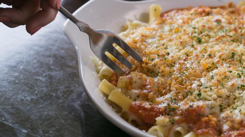 Gratineed pasta and fork