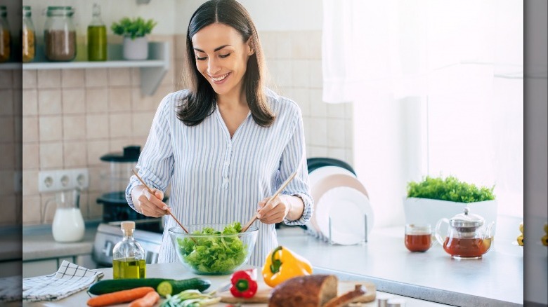 Woman preparing a salad 