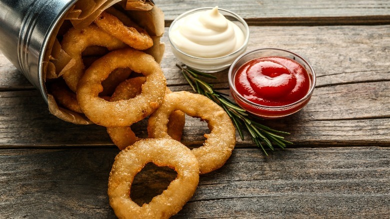 onion rings with ketchup and mayonnaise
