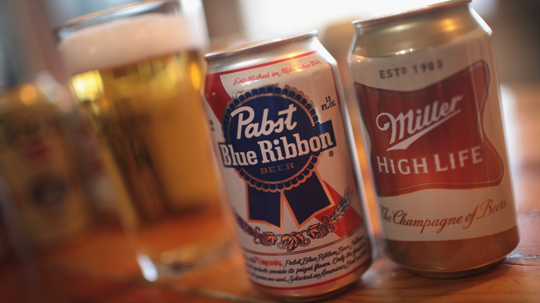 pabst blue ribbon and miller high life cans