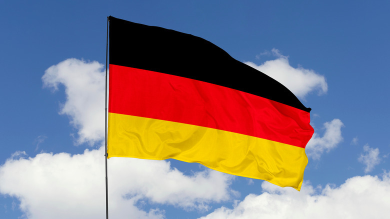 German flag on sky background