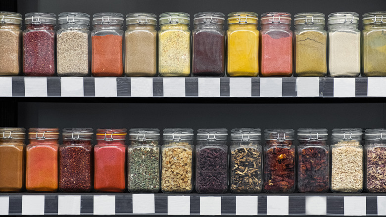 Ground spices lined up on shelf