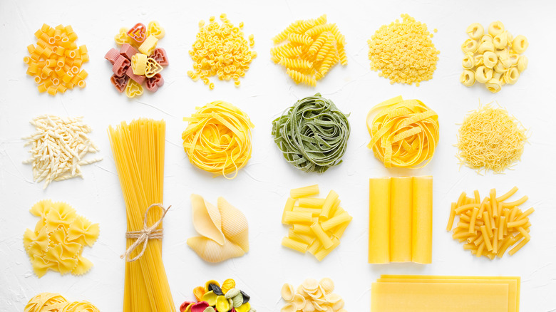 Assortment pastas on white background