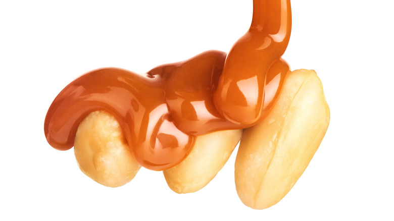 Caramel drizzle on peanuts