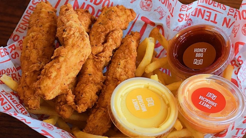 Chicken tenders and fries in a basket