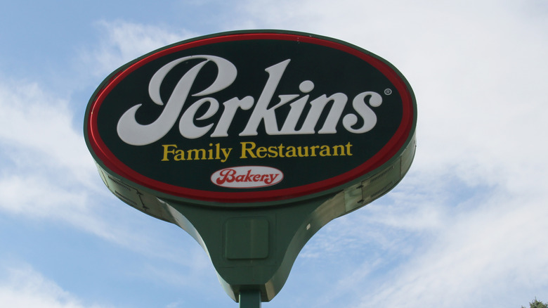 Perkins tower sign, green white yellow and red
