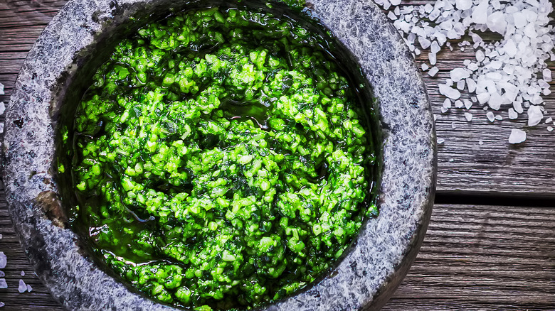 Pesto in mortar with salt 