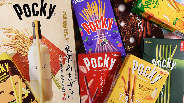 Assorted Pocky boxes piled together