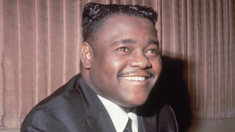 Fats Domino smiling at piano