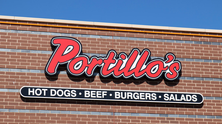 portillo's sign on brick wall