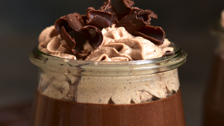 A jar of chocolate pudding