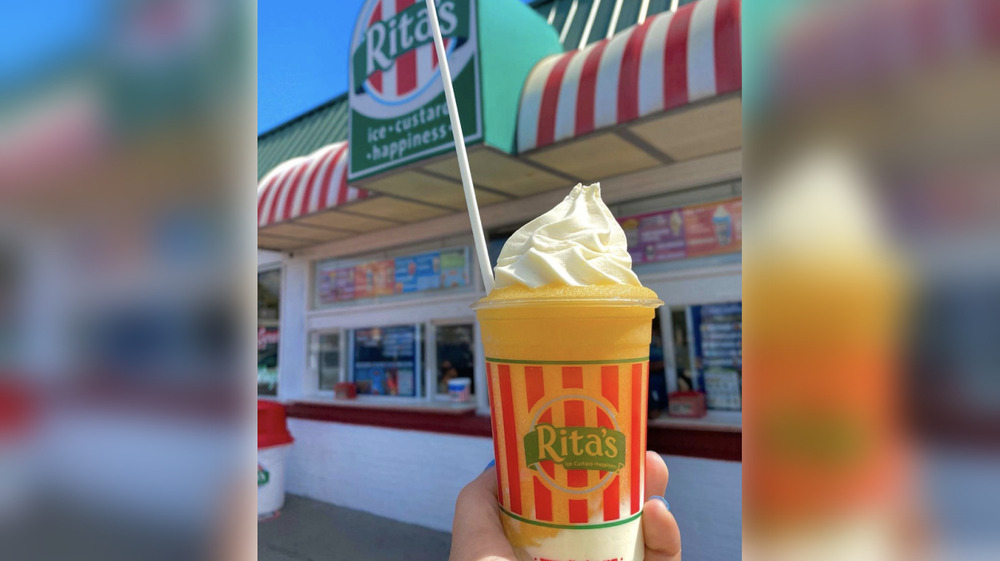 Rita's Italian Ice with whipped cream and straw