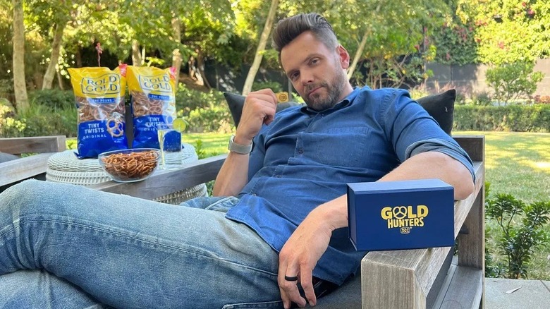 Joel McHale with rold gold pretzels