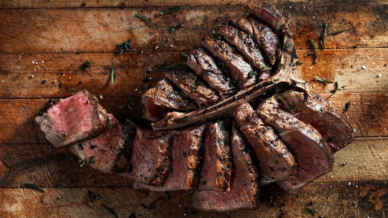 sliced t bone steak at Saltgrass Steakhouse