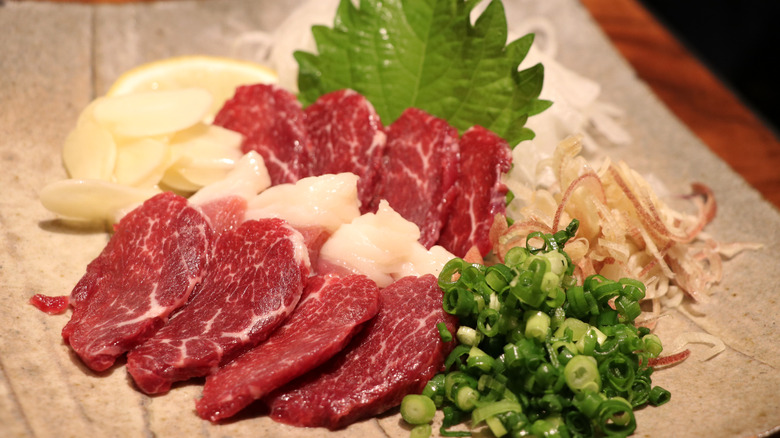 Plate of raw meat sashimi 