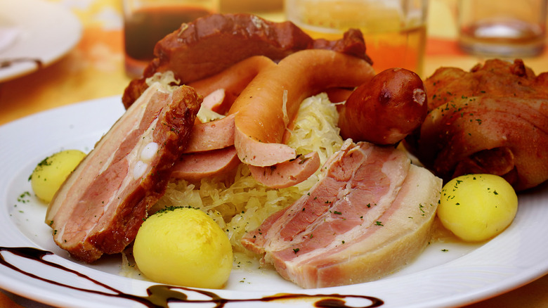 plate of choucroute garnie with potatoes