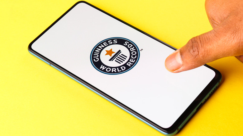 The Guinness World Record logo on a smart phone.