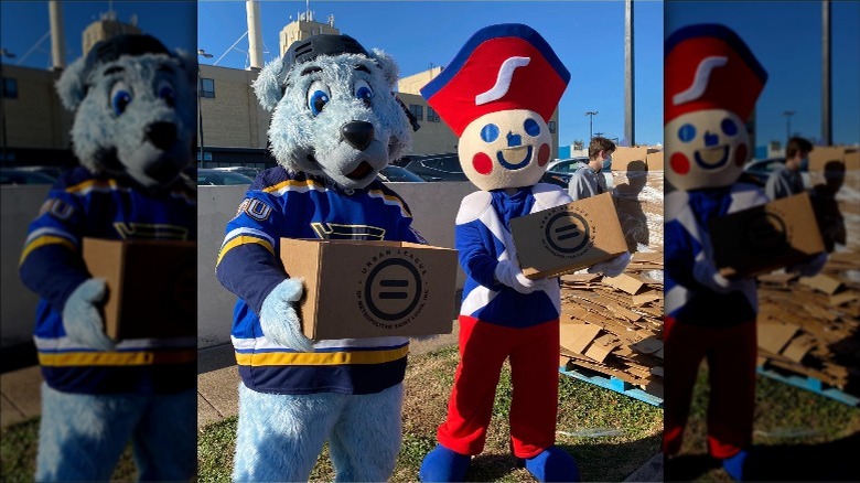 Schnucks' mascot Henry with St Louis Blues' mascot Louie