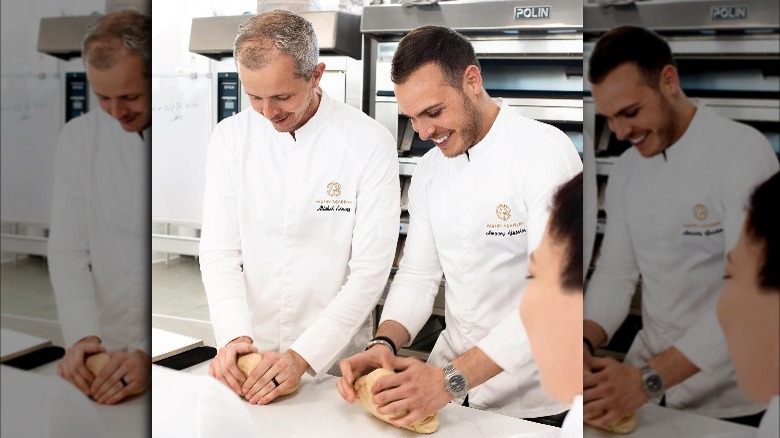 Amaury Guichon working in the kitchen with colleague