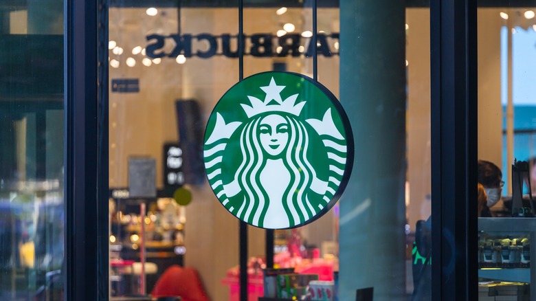 Starbucks storefront window and sign  